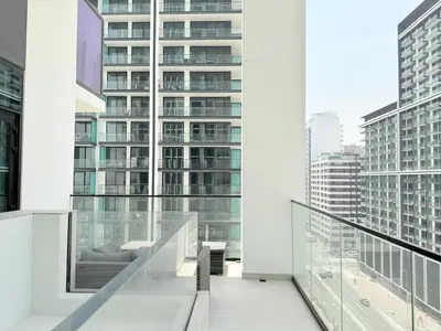 a balcony with a view of a large building at Brand New with Installed Private Pool in Balcony in Dubai