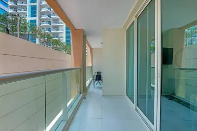 a hallway of a building with a balcony at Waves - Gold Opulence 1 BR in Marina in Dubai