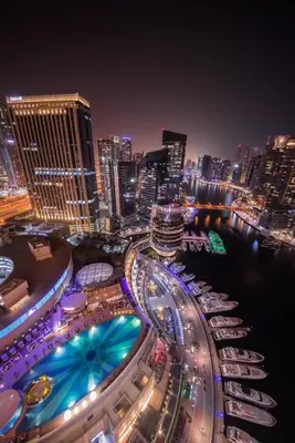 a view of a city at night with buildings at Dubai Marina Luxury Lifestyle - Sun Sand & Views in Dubai