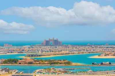 a view of a city and the water at Royal Oceanic Elegant 2BR with Marina View in Dubai