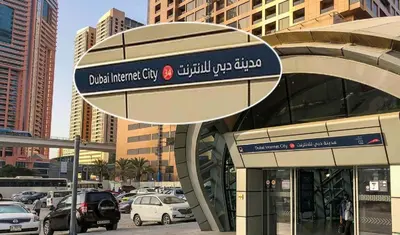 a building with a sign on the side of it at Attractive Partition Room Tecom Barsha Heights in Dubai