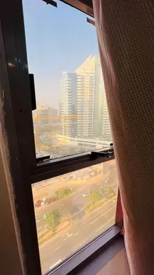 a view from a window of a city at Pleasing Partition Room Barsha Heights tecom in Dubai