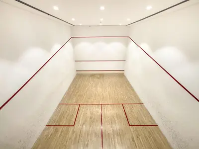 an empty room with a wooden bowling alley at VayK - Chic 1BR with Marina View in Park Island in Dubai