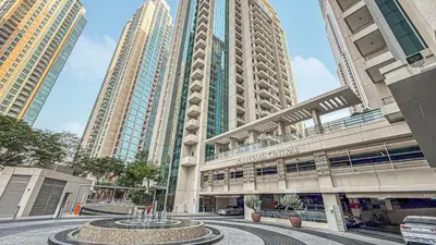 a view of a building with tall buildings at Chic Studio Apartment, Pool and Balcony, Steps to Burj Khalifa in Dubai