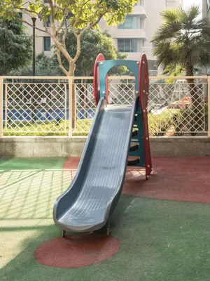 a slide at a playground in a park at The Burj View Suite Luxury 1BR Full Burj Views in Dubai