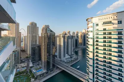 a view of a city with a river and buildings at Elegant Living in the Heart of Dubai Marina in Dubai