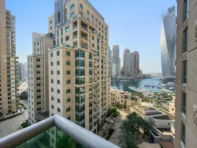 a view of a city with tall buildings and a river at Sleek and Spacious 2BR at Dubai Marina, Near Beach in Dubai