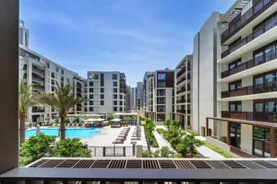 an image of an apartment complex with a swimming pool at Spacious 3BD apartment at Creek Beach, Dubai in Dubai