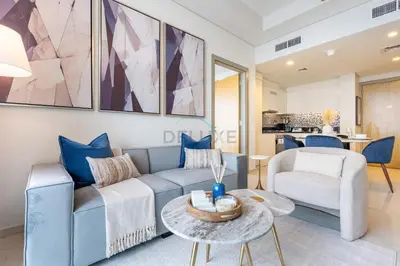 a living room with a couch and a table at High-Floor Skyline View Near Safa Park and Godolphin Stables with Easy Access to Dubai Mall and Canal, Aykon City 2 Tower C, Business Bay by Deluxe Holiday Homes in Dubai
