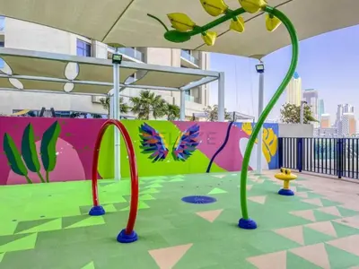a childrens play area with a painting of flowers at High-Floor Skyline View Near Safa Park and Godolphin Stables with Easy Access to Dubai Mall and Canal, Aykon City 2 Tower C, Business Bay by Deluxe Holiday Homes in Dubai