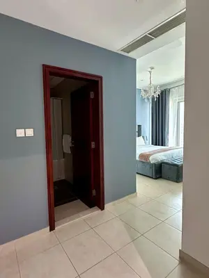 a room with a door leading to a bedroom at Luxury 2 BR Apartment Marina View in Dubai