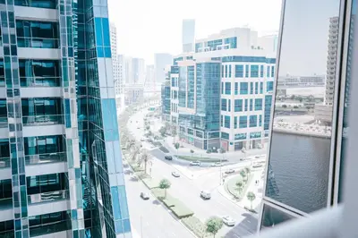 a view of a city street from a skyscraper at Modern Studio in Business Bay l Pool, Gym & Sauna in Dubai