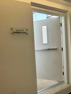 a door with a sign that reads swimming pool at Stay Inn AlBarsha by PHM in Sabkhah