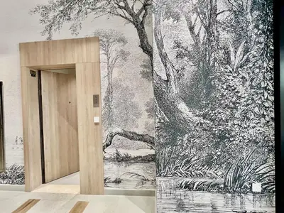 a wall mural with a drawing of a forest at Karama stunning unit for 4 in Dubai