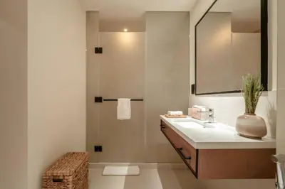 a bathroom with a sink and a mirror at Seraya Residences at Marina Yacht Club - Vida Marina in Dubai