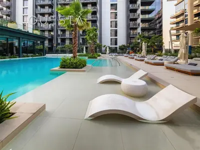 a view of a swimming pool with a sculpture in a building at Kensington Waters, MBR City, Dubai in Dubai