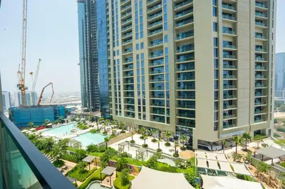 an aerial view of a large building with a pool at High-Floor 2BR - Aykon City 2BR in Business Bay in Dubai