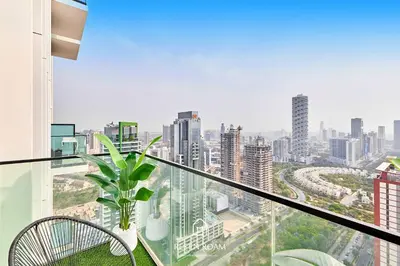 a balcony with a view of a city at Luxury 1B - CityView Near Parks and Mall JVC in Dubai