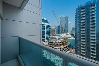 a view of a city from the balcony of a building at Family-Friendly 4BR with Amenities Business Bay in Dubai