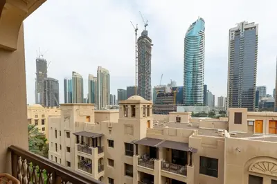 a view of a city skyline with tall buildings at Oasis in the heart of Downtown in Dubai