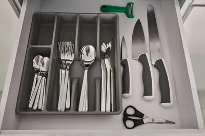 a drawer with utensils in it with a drawer at Luxury 58th Floor Seaview 2BR - Paramount Midtown - 6 Guests - 64F Pool Access & Burj View in Dubai