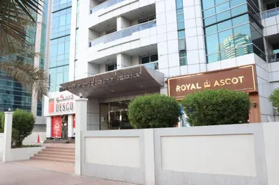 a building with a sign for a resort at Modern Studio in Marina in Dubai