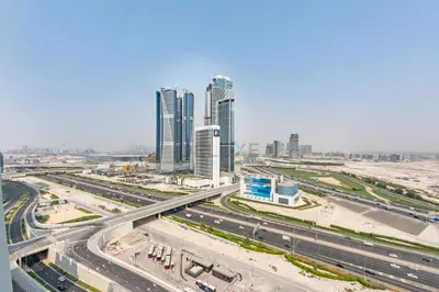 an aerial view of a city with tall buildings at Spacious Balcony with Private Jacuzzi and Stunning Views, Easy Public Transport Access, Terraces Marasi Drive, Business Bay by Deluxe Holiday Homes in Dubai