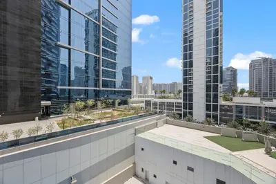 an apartment balcony with a view of the city at Modern Studio in Business Bay, Stylish & Central in Dubai