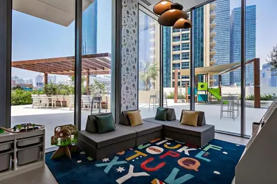 a living room with a couch and large windows at Exciting 1BR apartment Liv Marina in JBR in Dubai