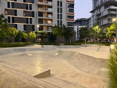 a skate park with a skateboard ramp in a city at 1BR Luxury Stay in Sobha Hartland in Dubai