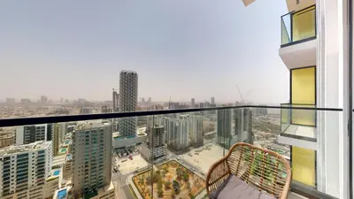 a balcony in a building with a view of a city at Binghatti Tulip - High Rise Upgraded Studio in JVC in Dubai