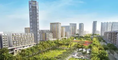 a city with tall buildings and a park with palm trees at Silk Valley - Modern 2BR Near Park & Attractions in Dubai