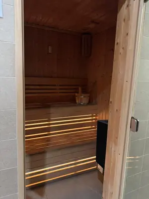 a sauna with a bench inside of it at Unique & Stunning Marina Views LIV Residence 2BR in Dubai