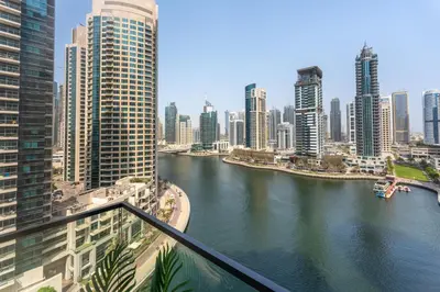 a view of a river in a city with tall buildings at Unique & Stunning Marina Views LIV Residence 2BR in Dubai