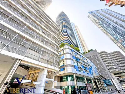 a group of tall buildings in a city at Hotel Apartment next to Dubai Mall,Views & Vibes in Dubai