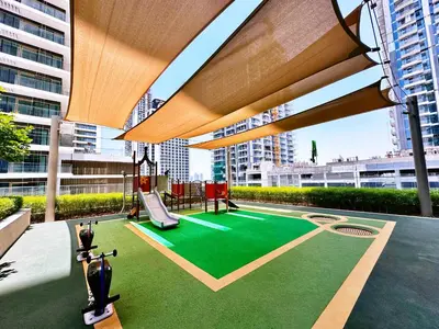 a playground in a building with a play area at Beach Isle 1 Emaar Beachfront - Mint Stay in Dubai