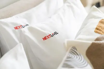 a white shirt with the word hereafter on it at Business Bay 1br with High-Floor Views in Dubai