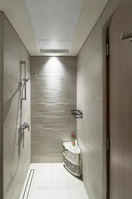 a bathroom with a shower and a toilet in it at Azizi Riviera 43 - Meydan by Golden Casa in Dubai
