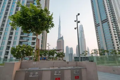 a view of a city skyline with tall buildings at Luxury2BR BurjKhalifa View Infinity Pool Mall Walk in Dubai