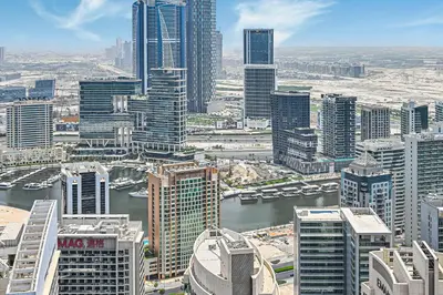an aerial view of a city with tall buildings at Golden Stays - Sky High 2BR I Burj Khalifa Views & Mallside Charm I Dowtown Dubai in Dubai