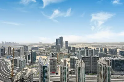 an aerial view of a city with tall buildings at Golden Stays - Sky High 2BR I Burj Khalifa Views & Mallside Charm I Dowtown Dubai in Dubai