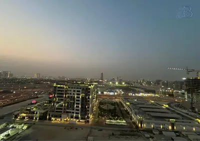 a view of a city at night with traffic at 1 Bedroom Apartment in Al Jaddaf - High-Floor with Dubai Skyline View in Dubai