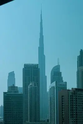 a view of a city skyline with the tallest skyscraper at 2 Bedroom Apartment in Business Bay Gym, Pool & View in Dubai