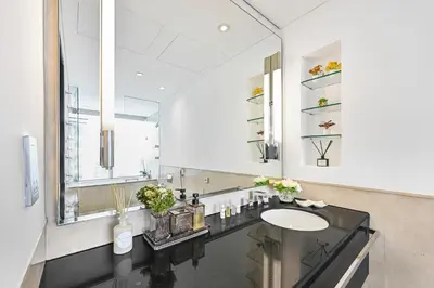 a bathroom with a sink and a mirror at One Bed Marina View on 34th floor in Dubai