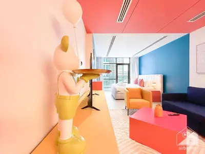 a room with a statue of a woman holding a plate at Colorful Studio with Balcony & City Views in Dubai