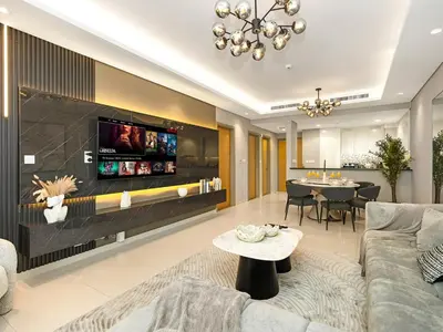 a living room with a couch and a table at Famous Infinity Pool with Burj Khalifa View on High Floor in Dubai