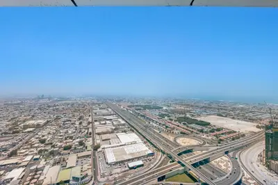 an aerial view of a city with traffic at Guest Favorite - Premium 3BR with Skyline Views at Floor 50 in Dubai