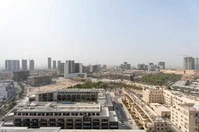 an aerial view of a city with tall buildings at GuestReady - New Gem | JVC | Binghatti Gardenia in Dubai