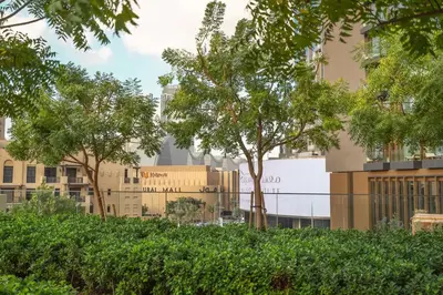 a view of a city with buildings and trees at Downtown Pulse Artful 1BR with Dubai Mall Access by Maxx Value Homes in Dubai