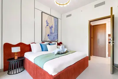 a bedroom with a large bed in a room at Downtown Pulse Artful 1BR with Dubai Mall Access by Maxx Value Homes in Dubai